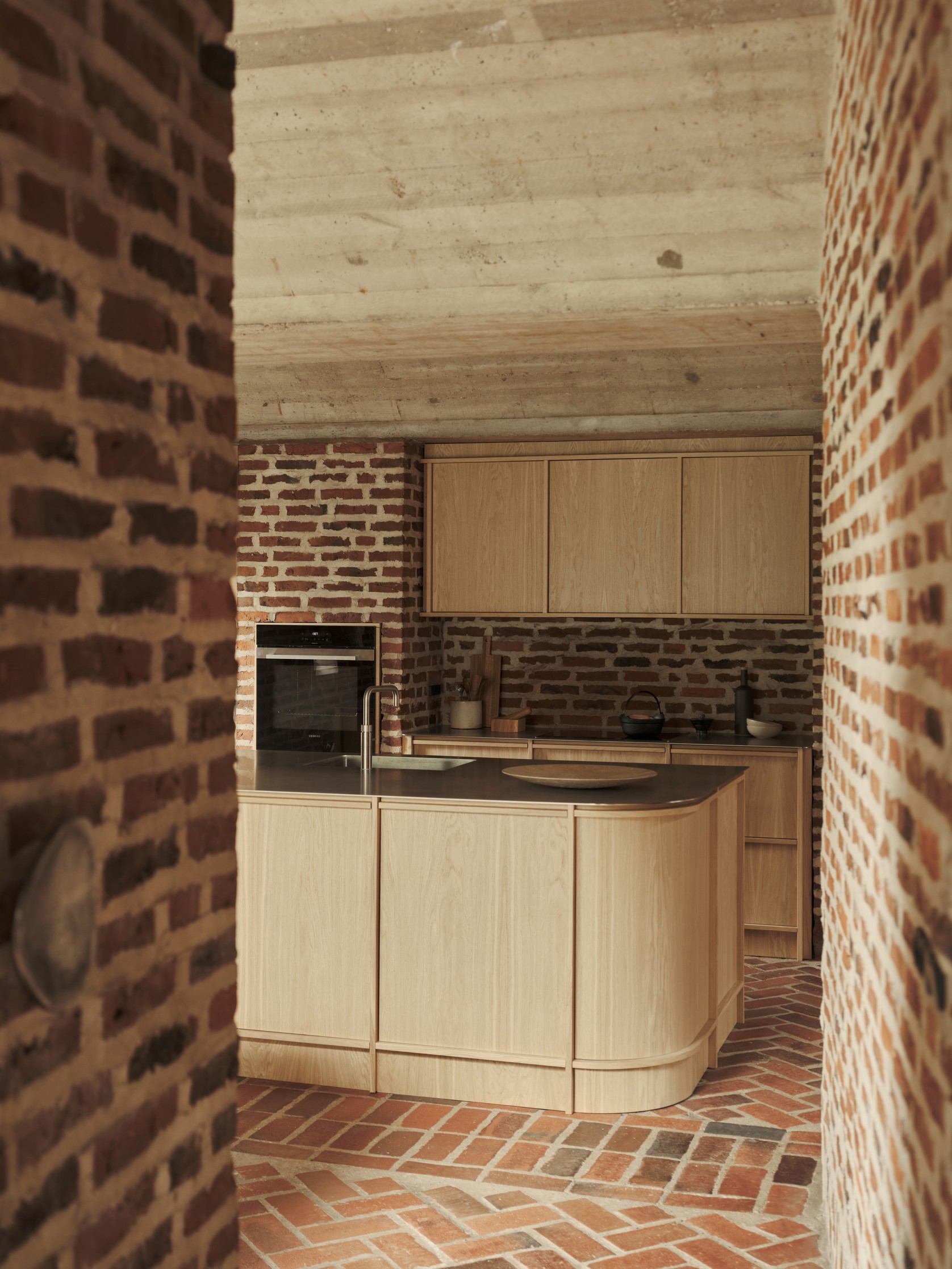 The Architect’s Danish Brick House Kitchen by Nordiska Kök